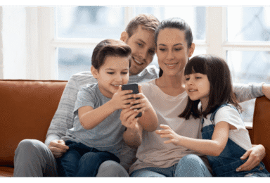 family with mobile phone